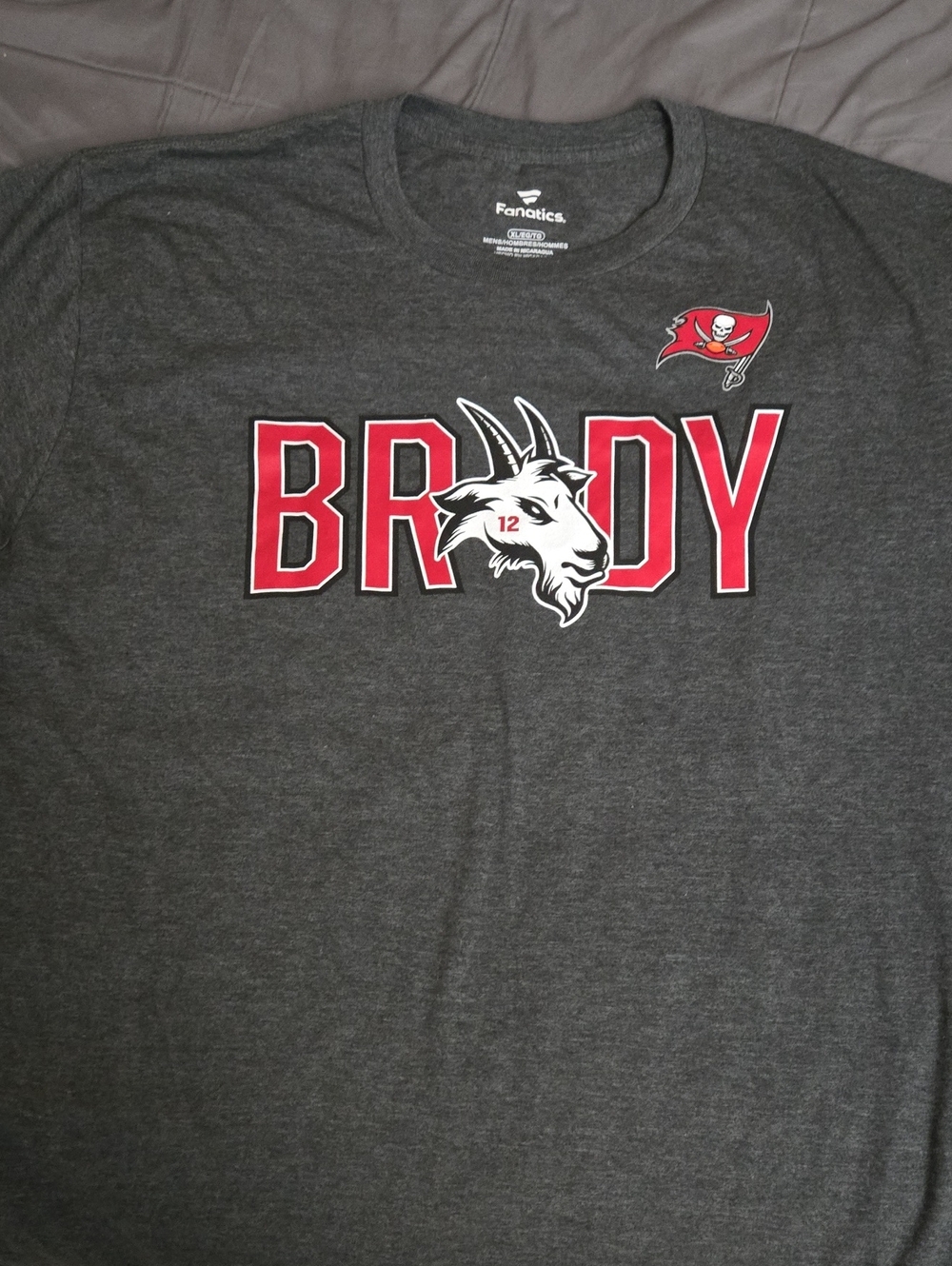 Tampa Bay Buccaneers Tom brady goat symbol. Brand new never been worn with tags.